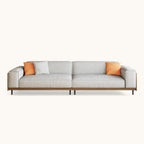 Deep lounge sofa side profile with walnut wood panel accents