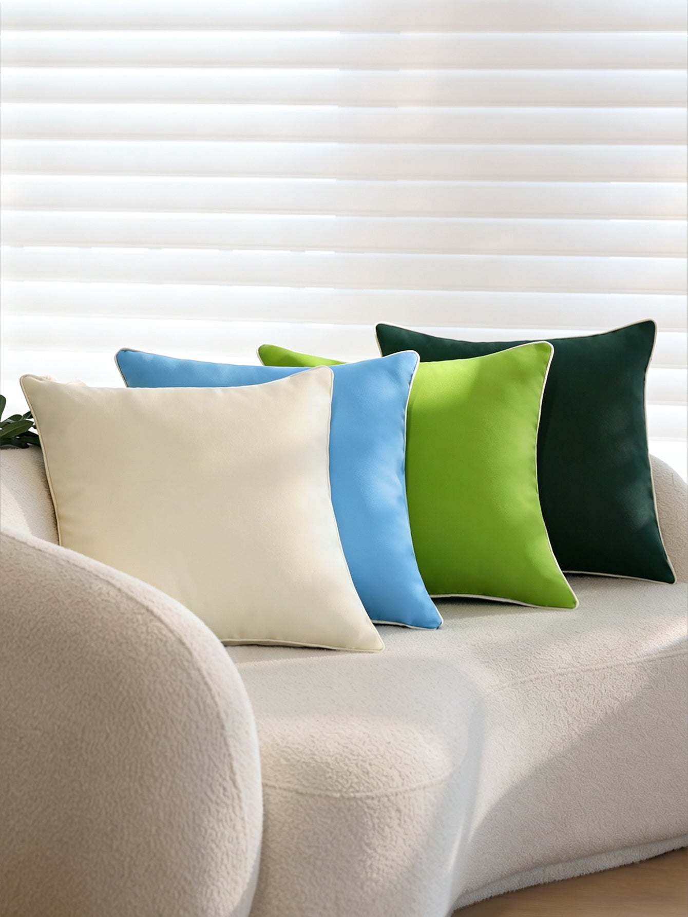 Cream outdoor pillow front view flat lay