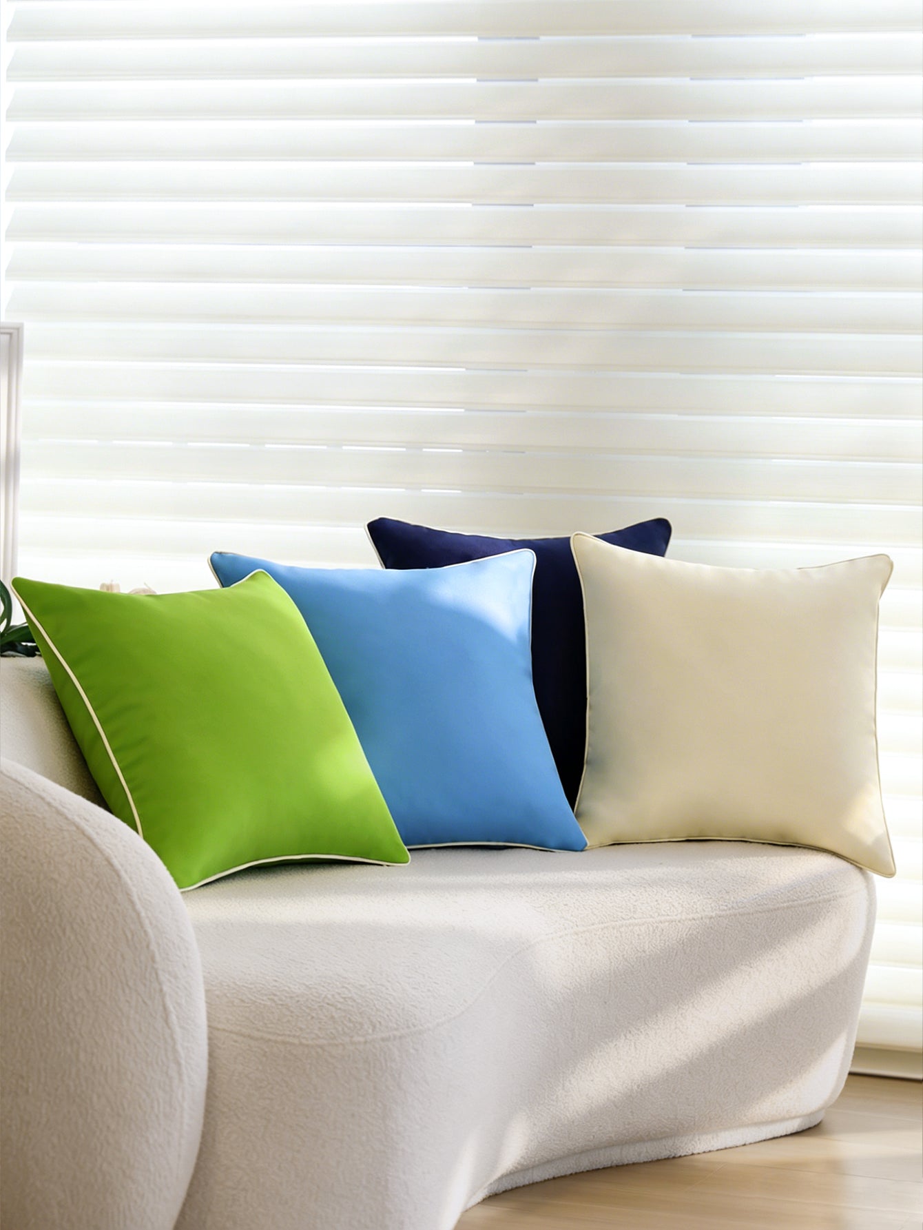Cream sofa cushion in styled living room