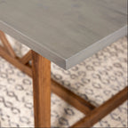 Gray brown trestle table in room