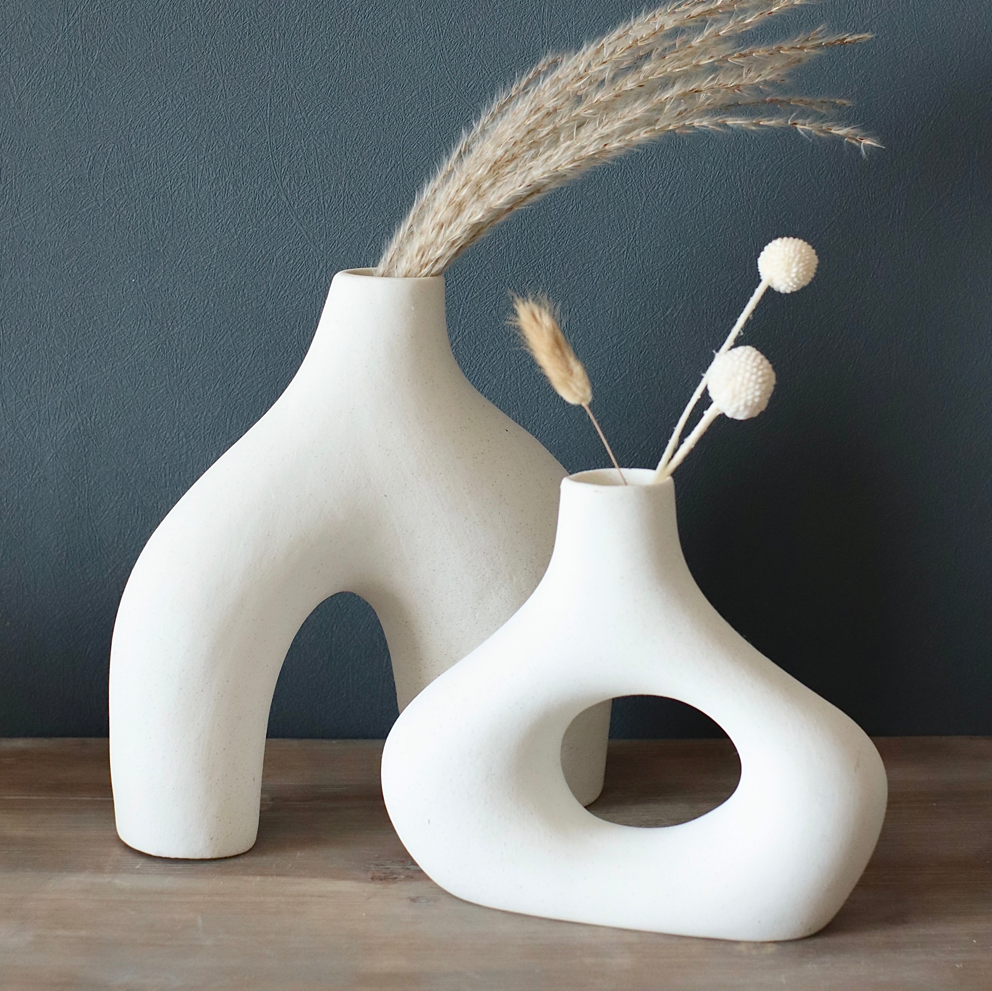 Ceramic hollow ring vase pair