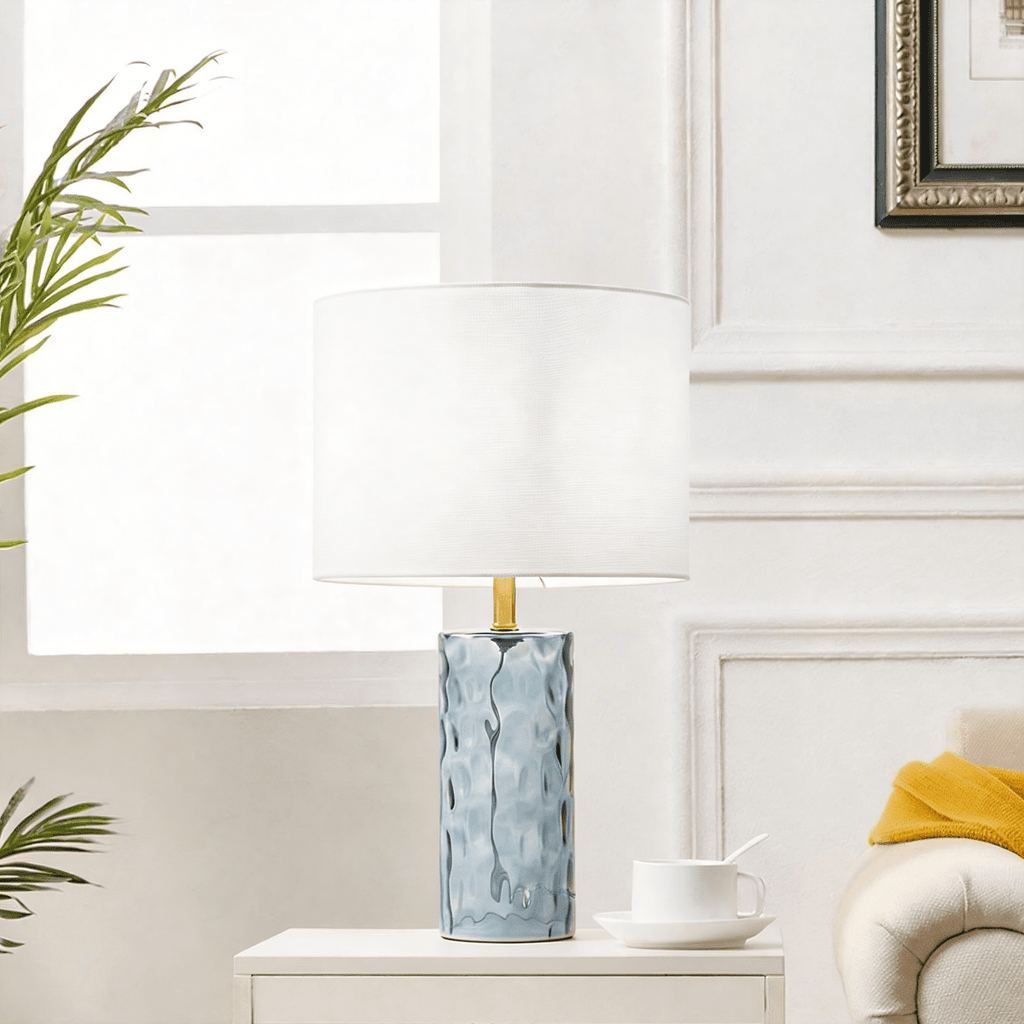 Set of 2 glass base table lamps illuminated