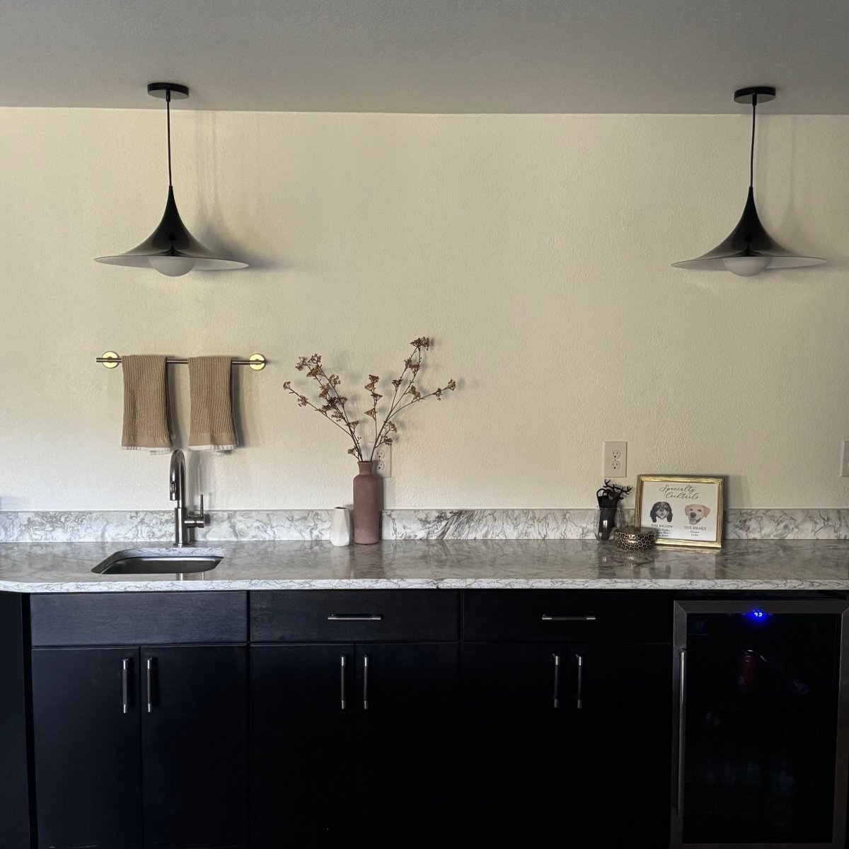 White trumpet shade pendant with glass globe diffuser close-up