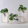 Marble and gold metal frame tabletop vase front view