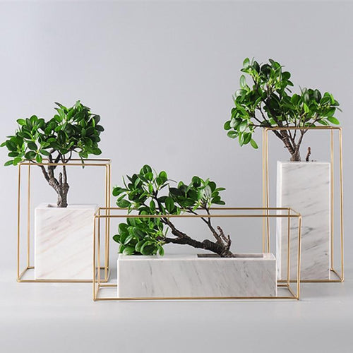 Marble and gold metal frame tabletop vase front view