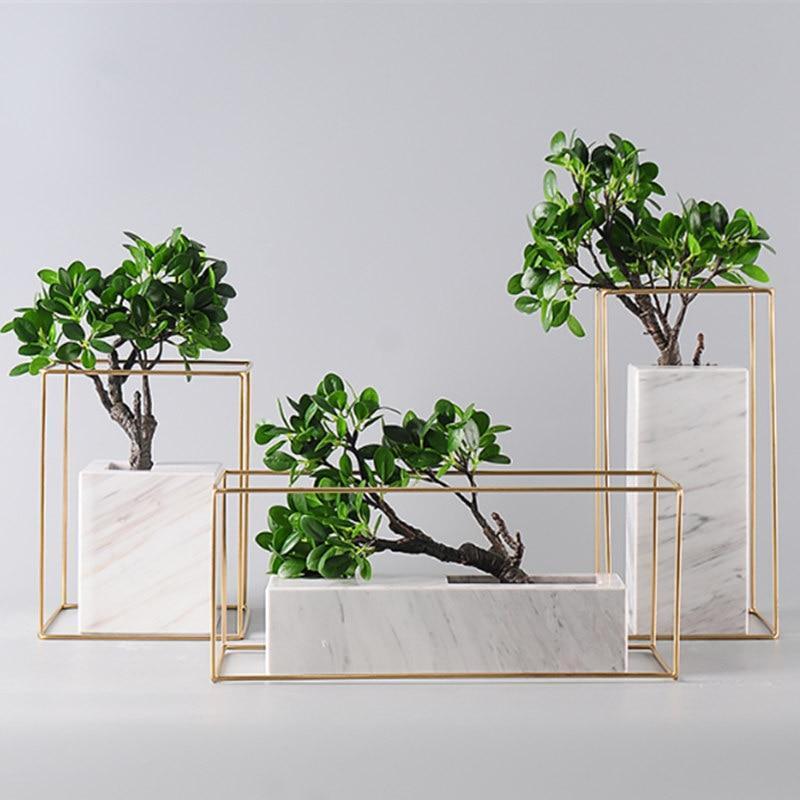 Marble and gold metal frame tabletop vase front view