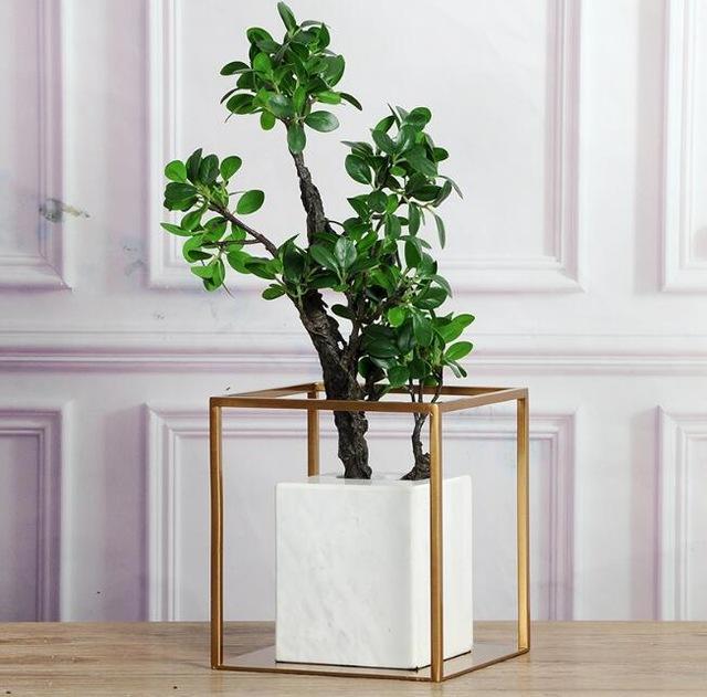 Close-up of marble stone veining and gold base