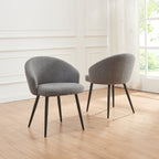 Modern low-profile dining chairs in navy in a Scandinavian dining room